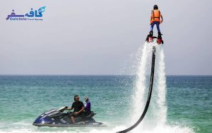 بنر اصلی تور کیش لحظه آخری شامل تصویر ساحل مرجانی و کشتی تفریحی، رزرو ارزان‌ترین پکیج‌های مسافرتی کیش در آژانس کافه سفر پاز